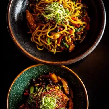 Chicken ramen stir fry with fresh vegetables and tender chicken pieces
