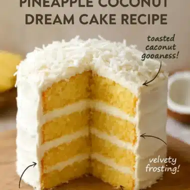 Delicious Pineapple Coconut Dream Cake with creamy frosting and pineapple garnish