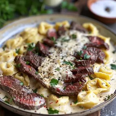 Cracked Garlic Steak Tortellini served in creamy sauce