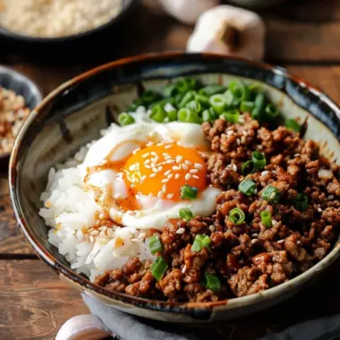 Korean Ground Beef Bowl garnished with green onions and sesame seeds