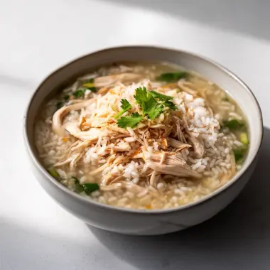 Coconut Chicken Brothy Rice - a cozy one-pot dish with rich flavors and textures.