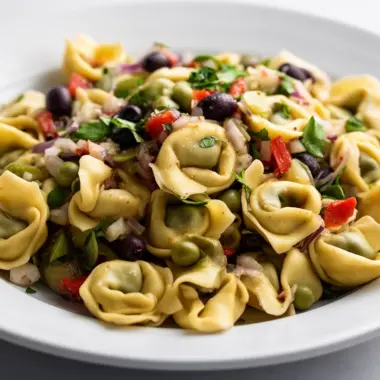 Colorful Tortellini Pasta Salad with fresh vegetables and dressing
